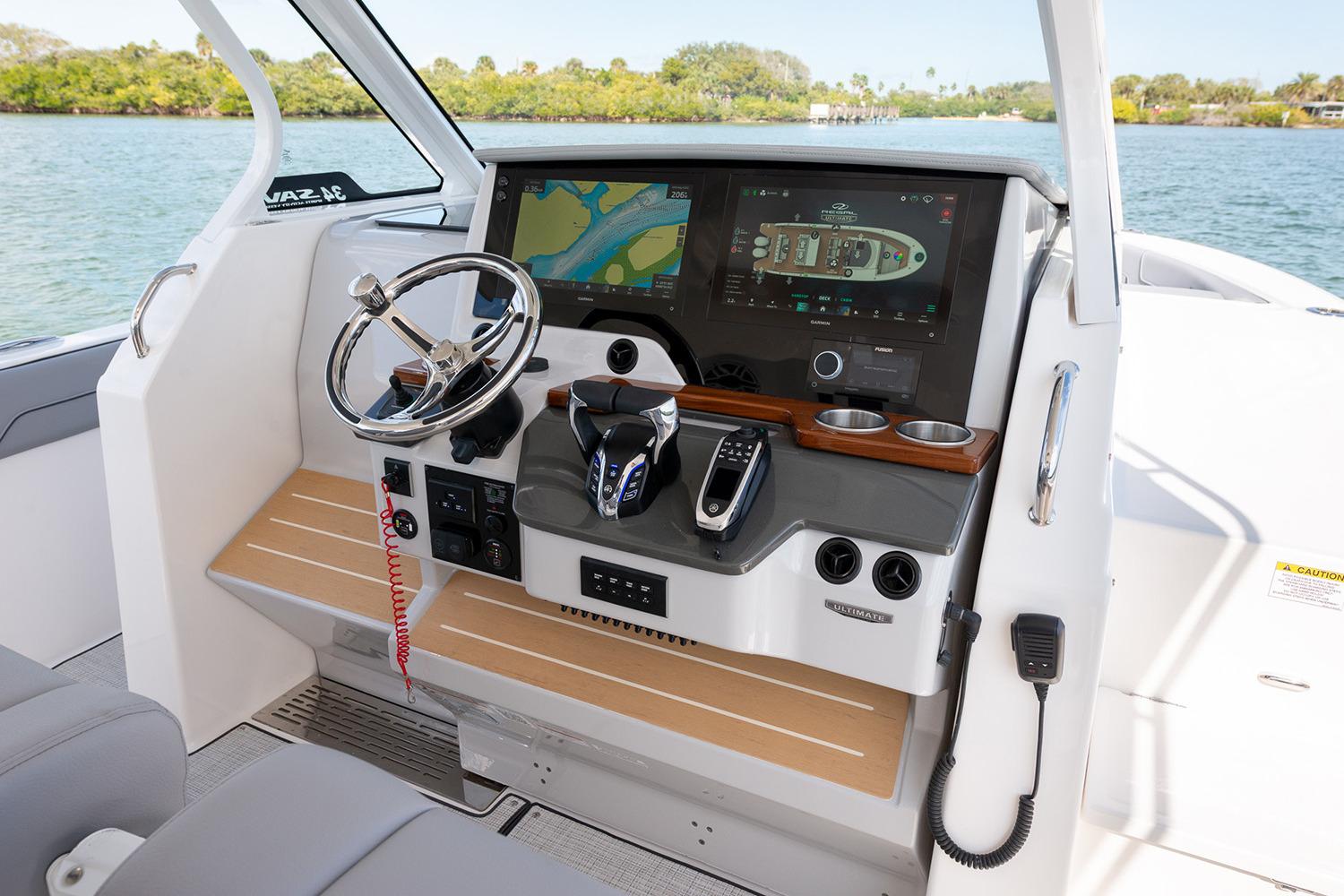 Manufacturer Provided Image: 2026 Regal 34 SAV boat helm with advanced navigation system and controls.