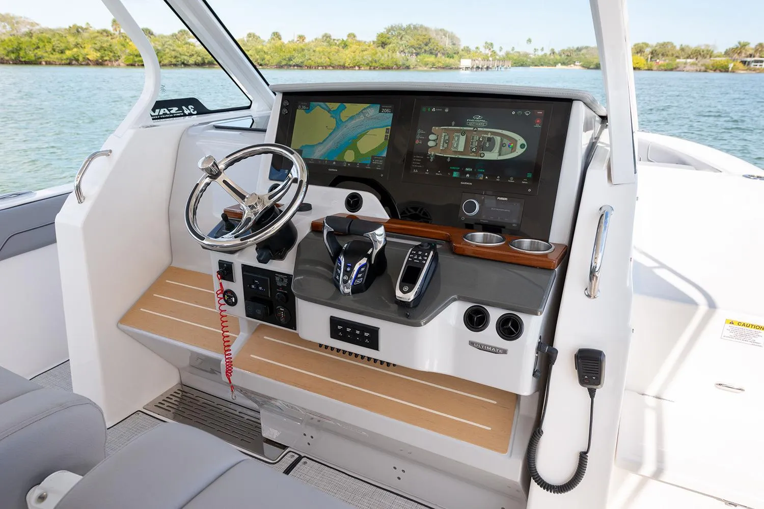 Manufacturer Provided Image: 2026 Regal 34 SAV boat helm with advanced navigation system and controls.