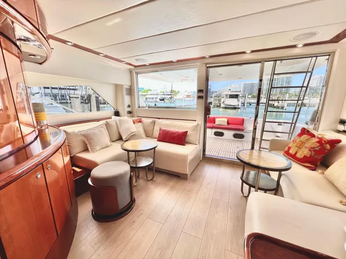 Por Fin Yacht Photos Pics Luxurious interior of a 1999 Fairline Squadron 65 yacht with modern furnishings.
