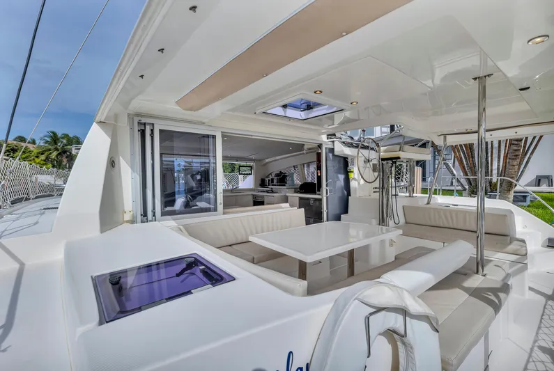  Yacht Photos Pics Luxurious 2017 Leopard 40 catamaran with spacious outdoor seating and modern interior design.