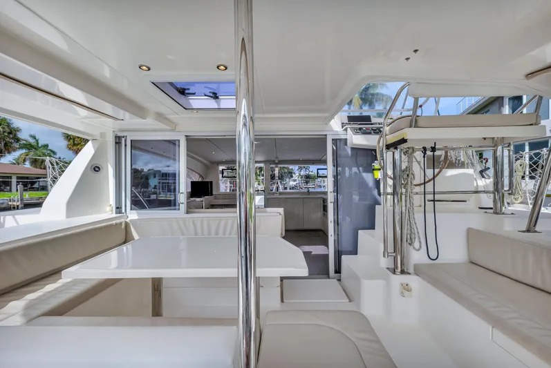  Yacht Photos Pics Luxurious interior of a 2017 Leopard 40 catamaran with modern seating and helm station.