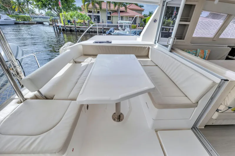  Yacht Photos Pics Luxurious seating area on a 2017 Leopard 40 catamaran with waterfront view.