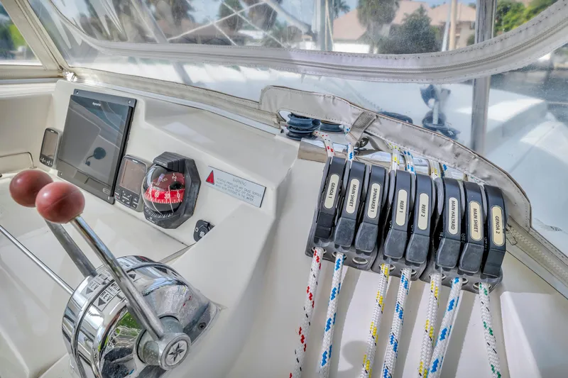  Yacht Photos Pics Control panel of a 2017 Leopard 40 catamaran with ropes and navigation equipment.