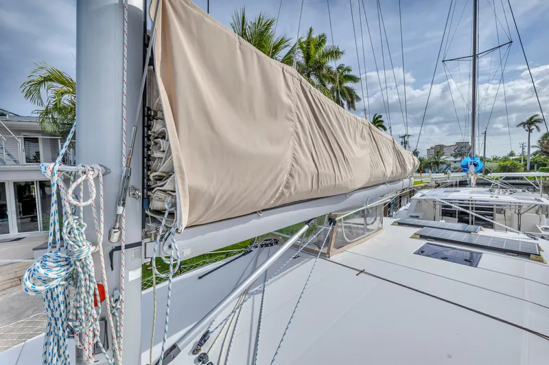  Yacht Photos Pics Sailboat deck view of 2017 Leopard 40 with covered sail and rigging.