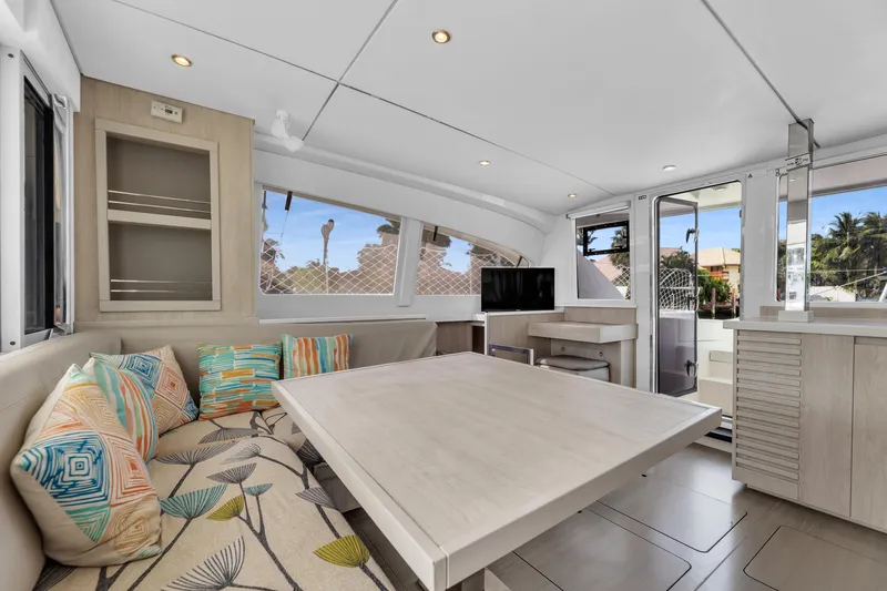  Yacht Photos Pics Modern interior of 2017 Leopard 40 catamaran with stylish seating and large windows.