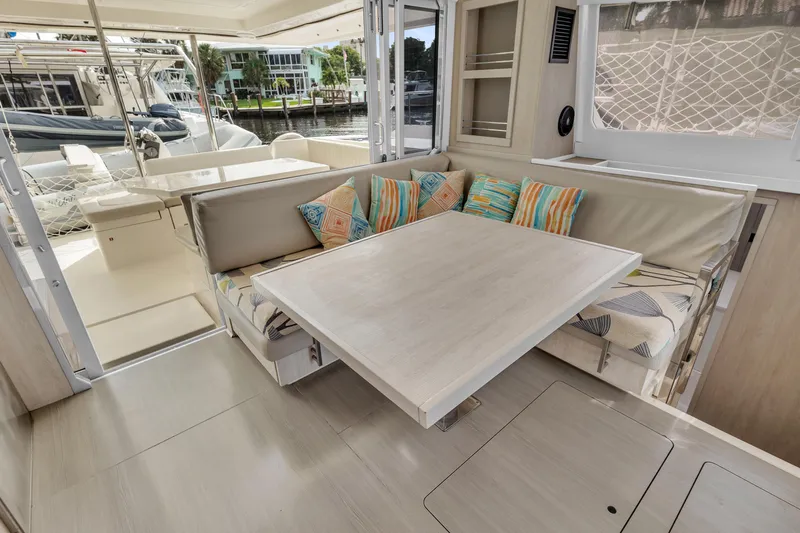  Yacht Photos Pics Luxurious 2017 Leopard 40 yacht interior with cozy seating and dining area.