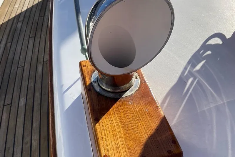 Begonia Yacht Photos Pics Ventilator on 1988 Custom Atkin & Lange Cutter, wooden deck background.