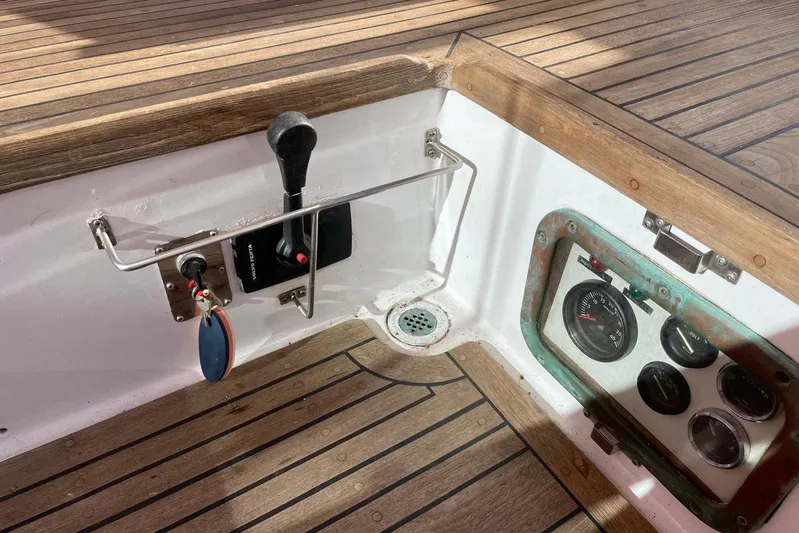 Begonia Yacht Photos Pics Cockpit controls of 1988 Custom Atkin & Lange Cutter with wooden deck and instrument panel.