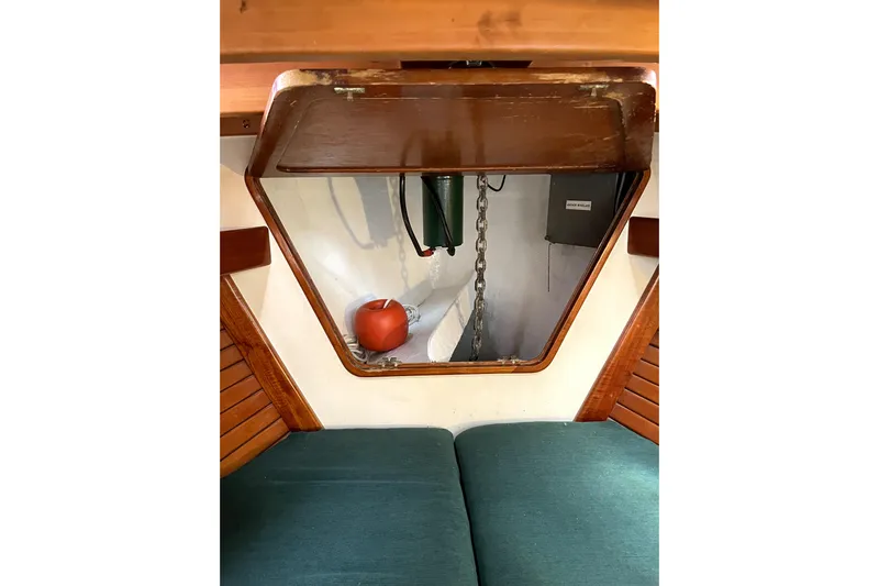 Begonia Yacht Photos Pics Interior of 1988 Custom Atkin & Lange Cutter with wooden accents and chain locker.