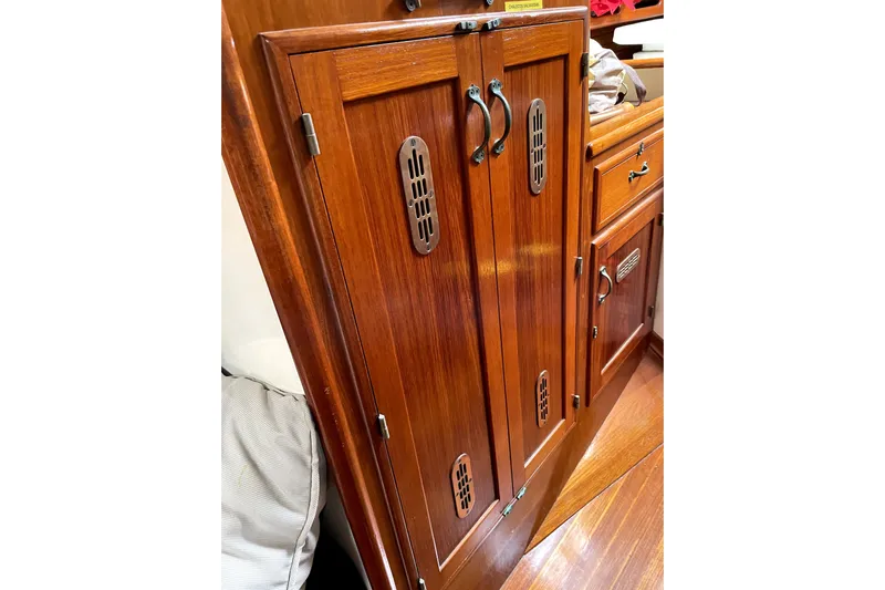 Begonia Yacht Photos Pics Polished wooden cabinetry on 1988 Custom Atkin & Lange Cutter yacht interior.