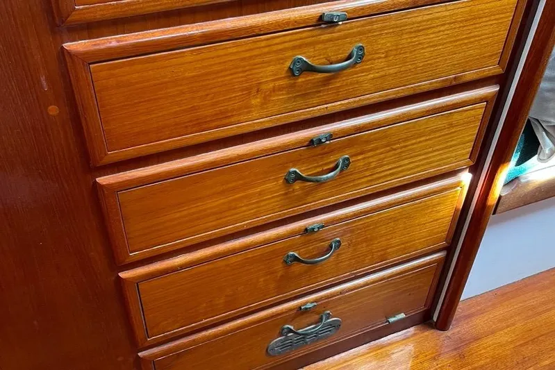Begonia Yacht Photos Pics Wooden drawers with metal handles on a 1988 Custom Atkin & Lange Cutter.