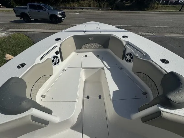  Yacht Photos Pics 2025 Key West 291 FS boat interior with seating and storage compartments.