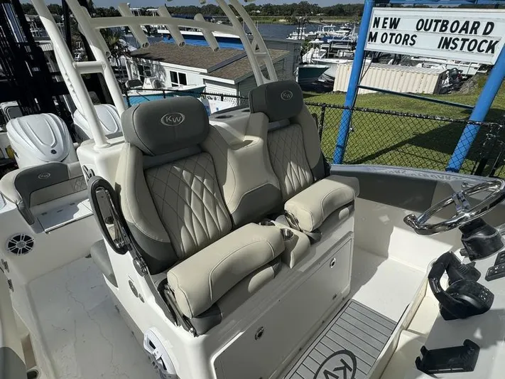  Yacht Photos Pics 2025 Key West 291 FS boat with luxurious seating and modern design.