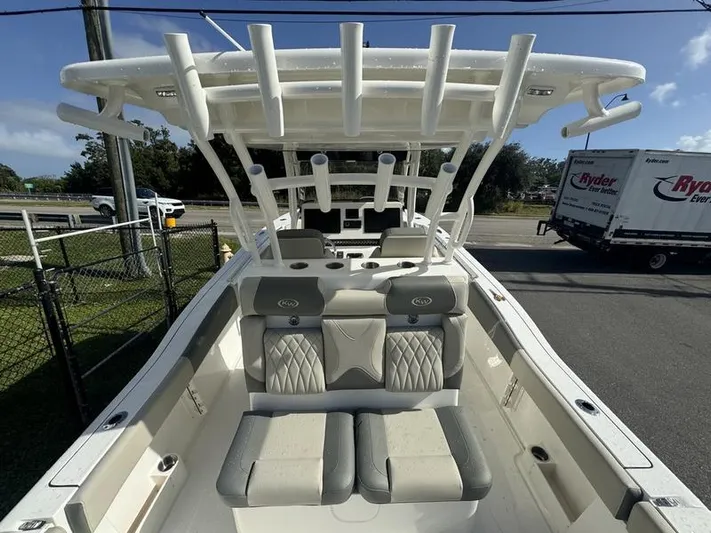  Yacht Photos Pics 2025 Key West 291 FS boat with cushioned seating and rod holders.