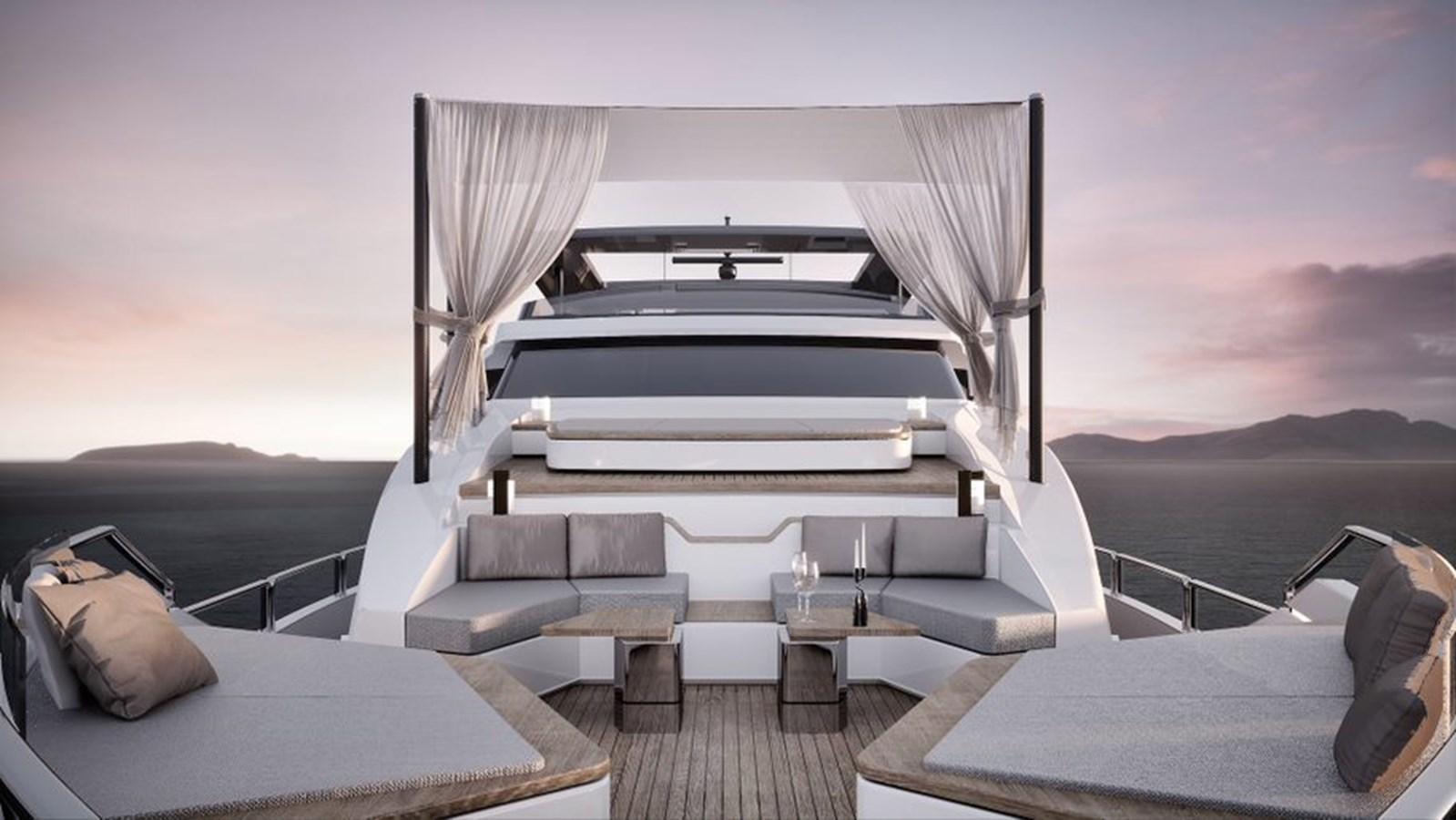 Luxurious 2026 Ladenstein L88 yacht deck with elegant seating and ocean view at sunset.