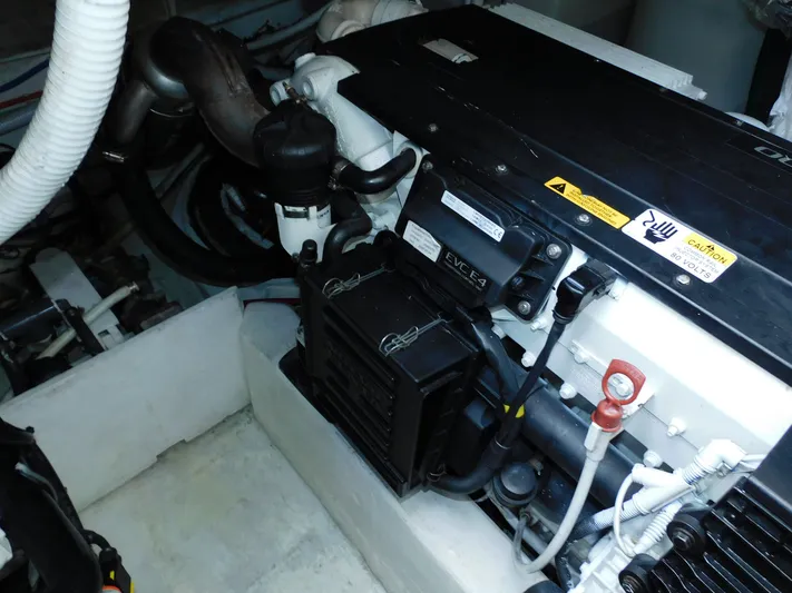 Relentless Yacht Photos Pics Engine compartment of a 2006 Tiara Yachts 4300 Sovran, showcasing mechanical components.