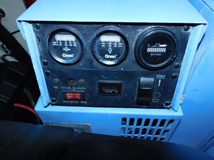 Relentless Yacht Photos Pics Control panel of a 2006 Tiara Yachts 4300 Sovran, featuring gauges and switches.