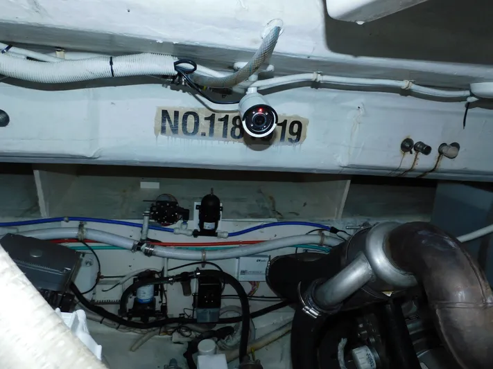 Relentless Yacht Photos Pics Engine room of 2006 Tiara Yachts 4300 Sovran with visible wiring and components.