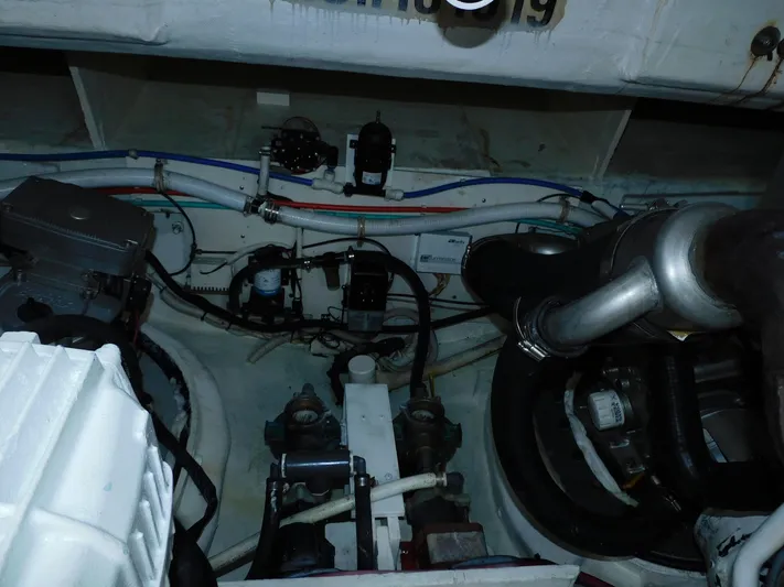 Relentless Yacht Photos Pics Engine room of 2006 Tiara Yachts 4300 Sovran with visible mechanical components.