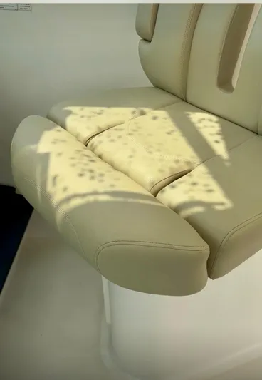  Yacht Photos Pics 2017 Pursuit OS 385 Offshore boat seat with sunlight pattern.