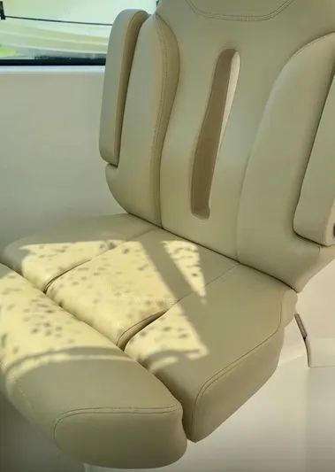  Yacht Photos Pics Beige leather seat in 2017 Pursuit OS 385 Offshore boat.