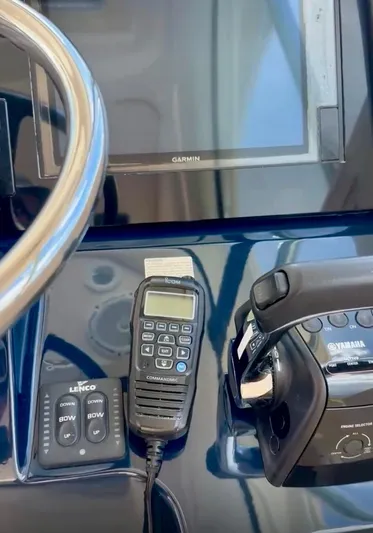  Yacht Photos Pics Control panel of 2017 Pursuit OS 385 Offshore boat with Garmin display and Yamaha controls.