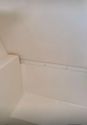  Yacht Photos Pics 2017 Pursuit OS 385 Offshore interior detail, showcasing clean white surfaces and sleek design.