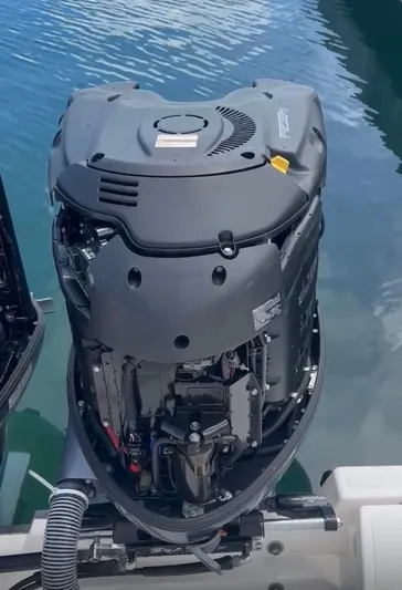  Yacht Photos Pics 2017 Pursuit OS 385 Offshore outboard motor on calm water.