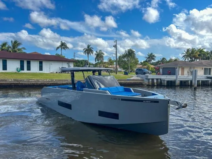  Yacht Photos Pics 2023 De Antonio Yachts D42 Open cruising in a sunny canal.