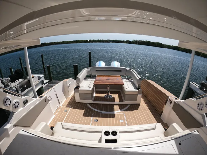  Yacht Photos Pics 2024 Tiara Yachts 43 LS luxury yacht with spacious deck and scenic water view.