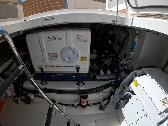  Yacht Photos Pics Engine compartment of 2024 Tiara Yachts 43 LS, featuring Fischer Panda generator.