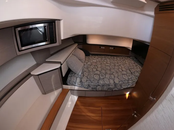  Yacht Photos Pics 2024 Tiara Yachts 43 LS cabin interior with bed and modern amenities.