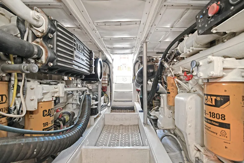 Journey Yacht Photos Pics Engine room of 2000 Torres 48 Enclosed Bridge with CAT machinery.
