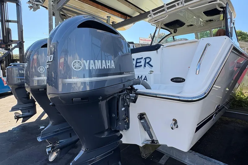  Yacht Photos Pics 2013 Pursuit OS 315 Offshore boat with Yamaha outboard engines, docked and ready for adventure.