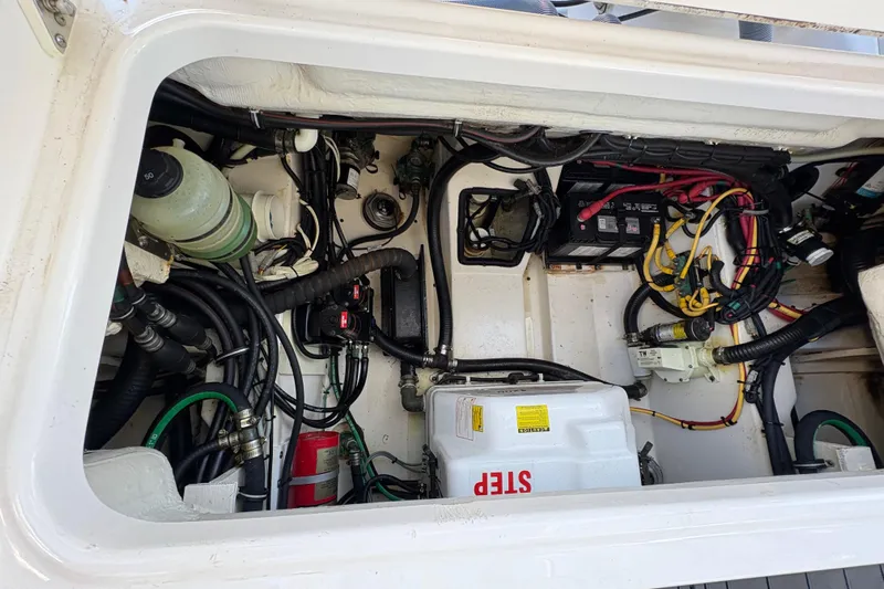  Yacht Photos Pics 2013 Pursuit OS 315 Offshore engine compartment with wiring and components.