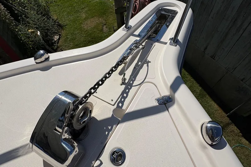  Yacht Photos Pics 2013 Pursuit OS 315 Offshore boat anchor system on deck.