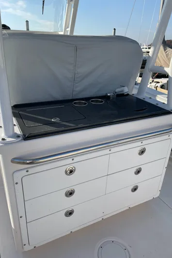  Yacht Photos Pics 2015 Edgewater 280CC boat with storage drawers and countertop.