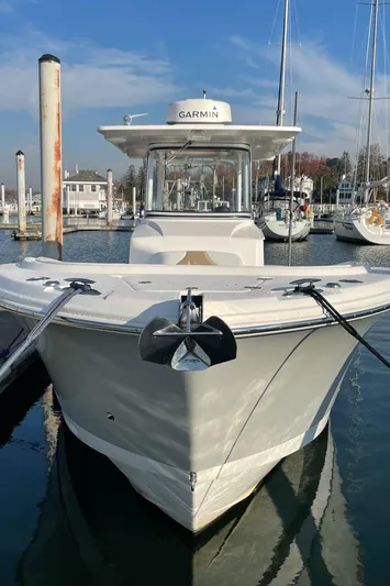  Yacht Photos Pics 2015 Edgewater 280CC boat docked in marina, featuring Garmin equipment.