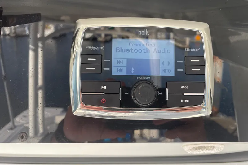  Yacht Photos Pics Polk Bluetooth audio system on 2015 Edgewater 280CC boat dashboard.