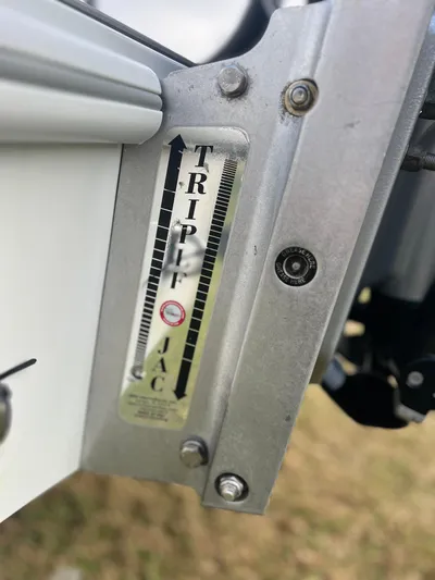 Yacht Photos Pics Close-up of a 2019 Yellowfin 36 Offshore boat's metal component with "TRIPLE JAC" label.