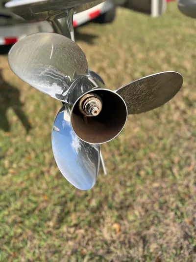  Yacht Photos Pics Close-up of a 2019 Yellowfin 36 Offshore boat propeller on grass.
