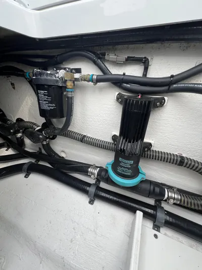  Yacht Photos Pics 2019 Yellowfin 36 Offshore boat engine compartment with hoses and filter system.