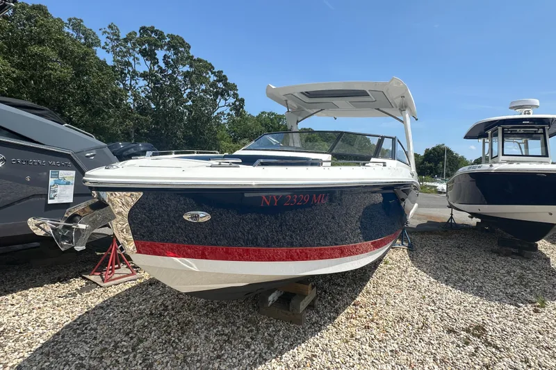  Yacht Photos Pics 2022 Cobalt A29 boat on display, featuring sleek design and vibrant colors.