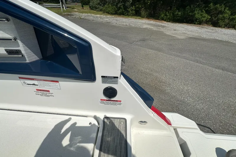  Yacht Photos Pics 2022 Cobalt A29 boat deck with warning labels and premium audio system.