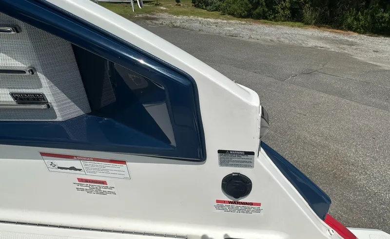  Yacht Photos Pics 2022 Cobalt A29 boat detail with warning labels and premium audio system.