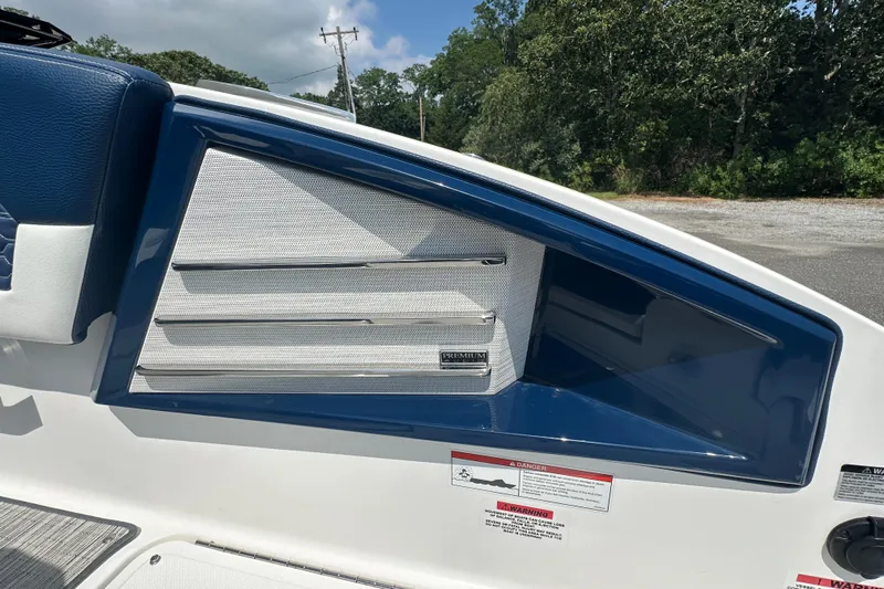  Yacht Photos Pics 2022 Cobalt A29 boat interior detail with blue and white upholstery.