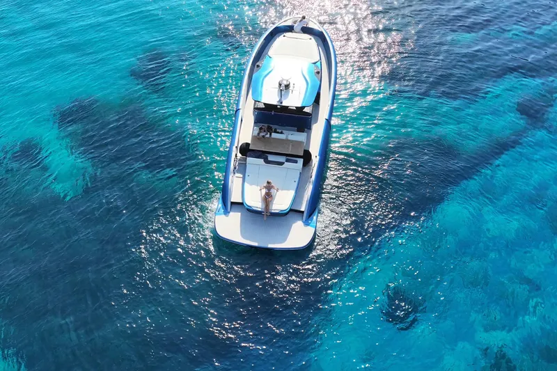 Aegean Infinity Yacht Photos Pics 2023 Solaris Power 44 Open yacht on clear blue water, aerial view.