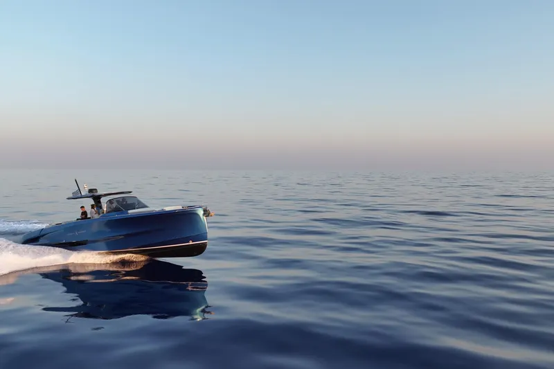 Aegean Infinity Yacht Photos Pics 2023 Solaris Power 44 Open yacht cruising on calm ocean waters at sunset.