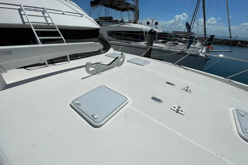  Yacht Photos Pics 2011 Maritimo 56 Cruising Motoryacht deck, featuring hatches and clear sky background.