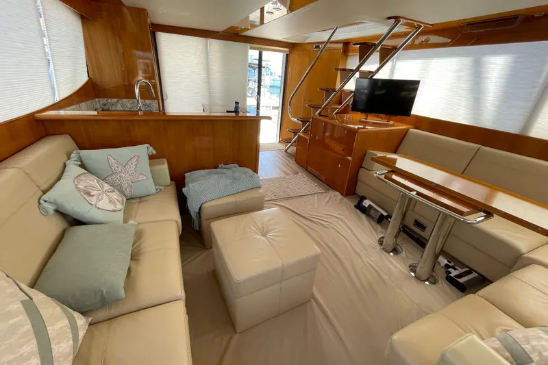  Yacht Photos Pics Luxurious interior of 2011 Maritimo 56 Cruising Motoryacht with plush seating and modern amenities.